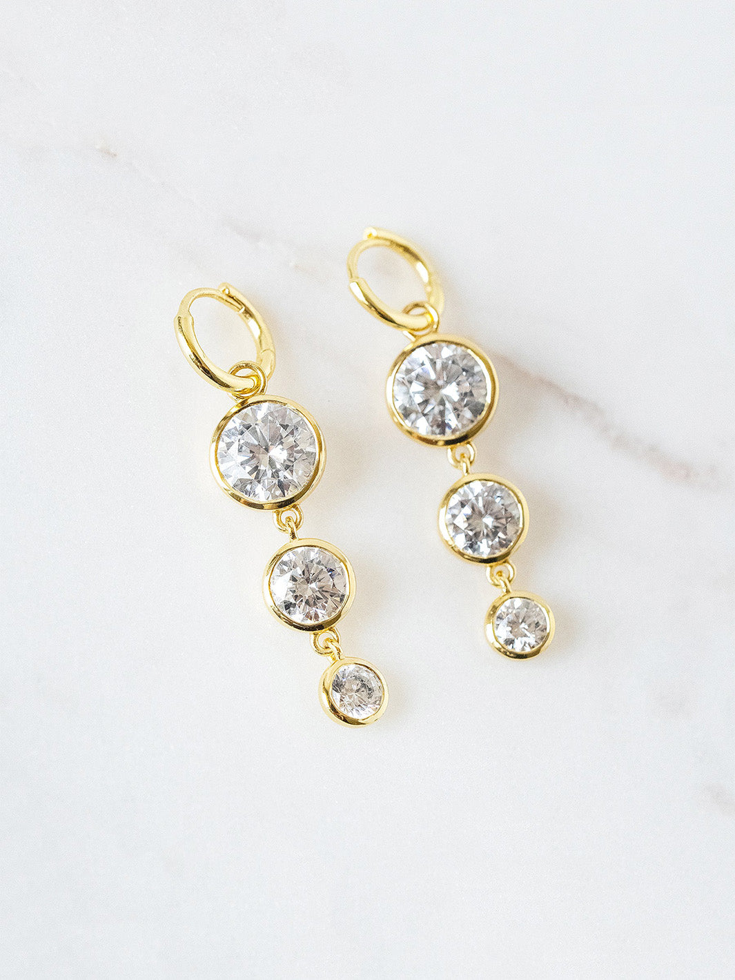Mini Dropping Circles Huggie Hoop Earrings in Cubic Zirconia