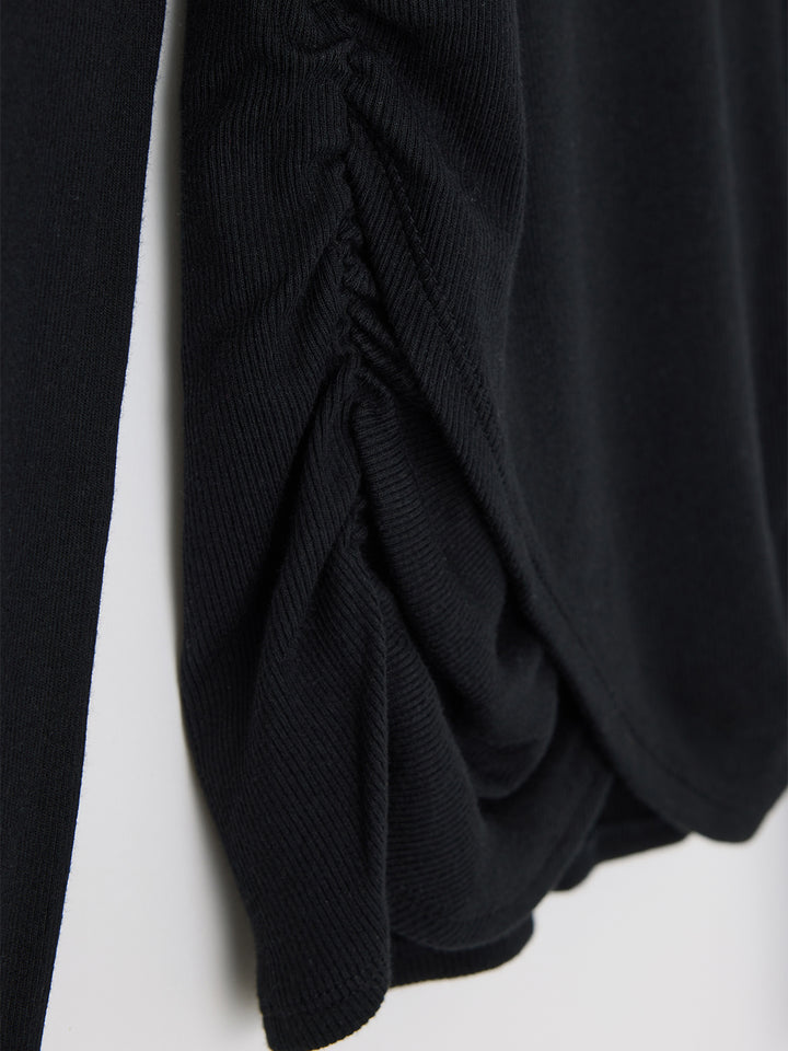 MV Crossover Hem Top in Black