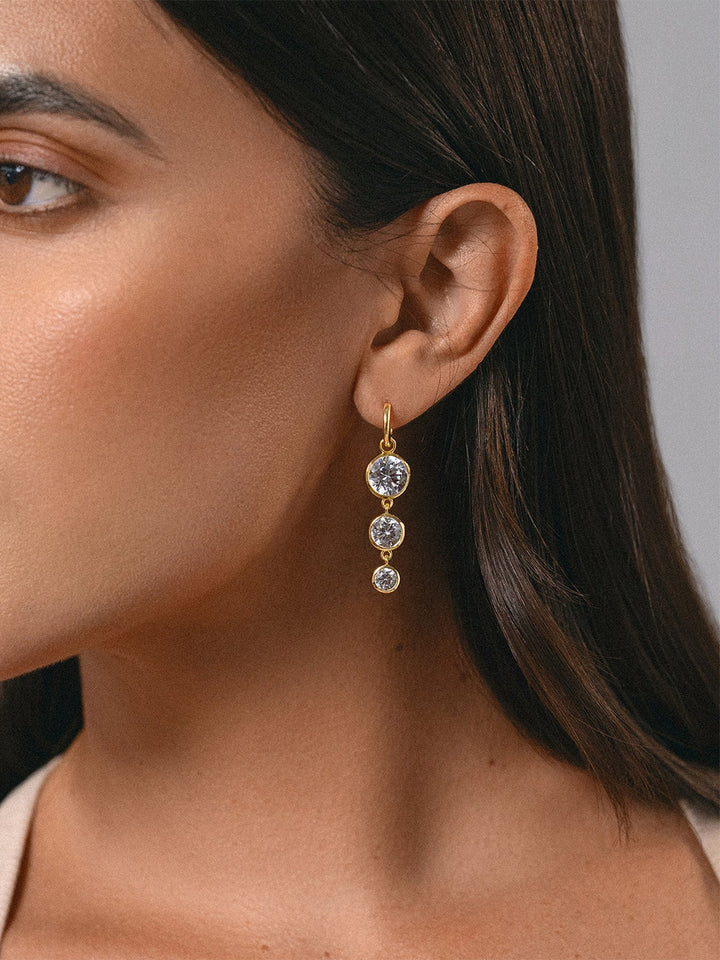 Mini Dropping Circles Huggie Hoop Earrings in Cubic Zirconia