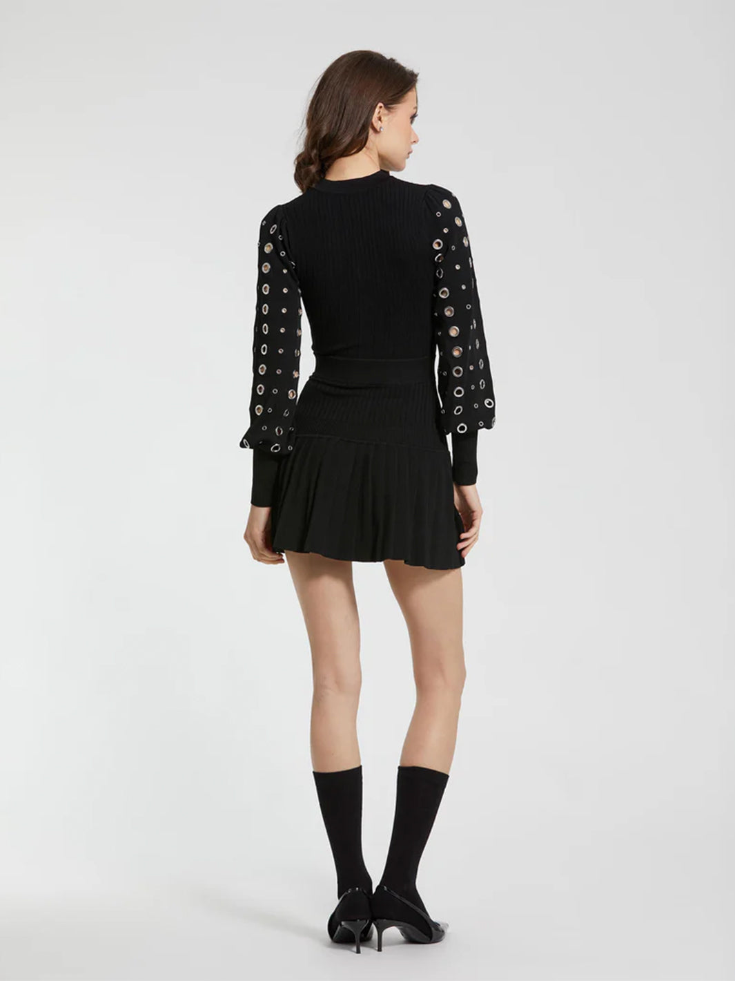 Knit Long Sleeve Grommet Mini Dress in Black